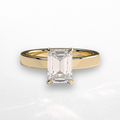 Emerald Statement Ring with Hidden Halo