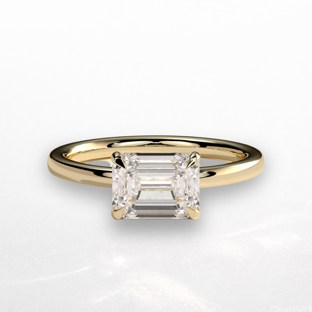 Emerald East West Solitaire Ring