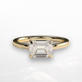 Emerald East West Solitaire Ring