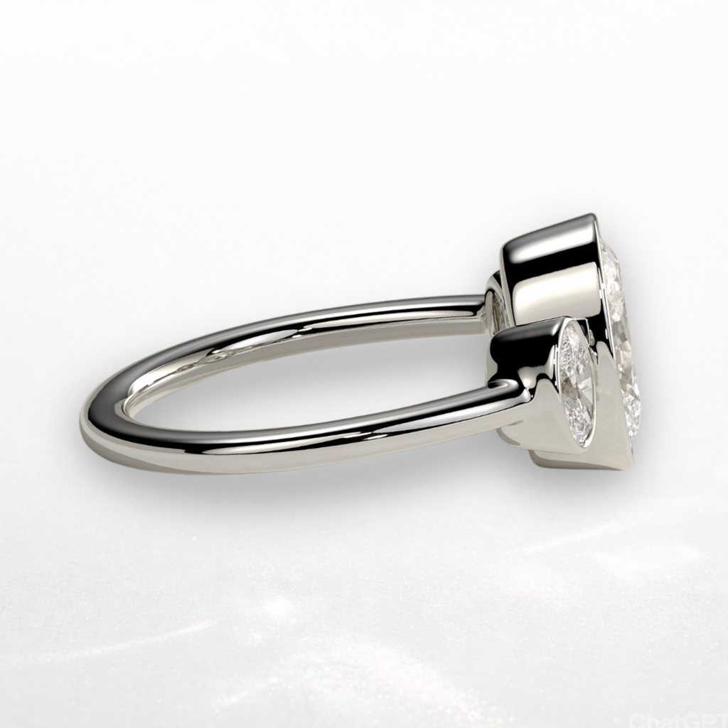 Oval Three Stone Bezel Ring