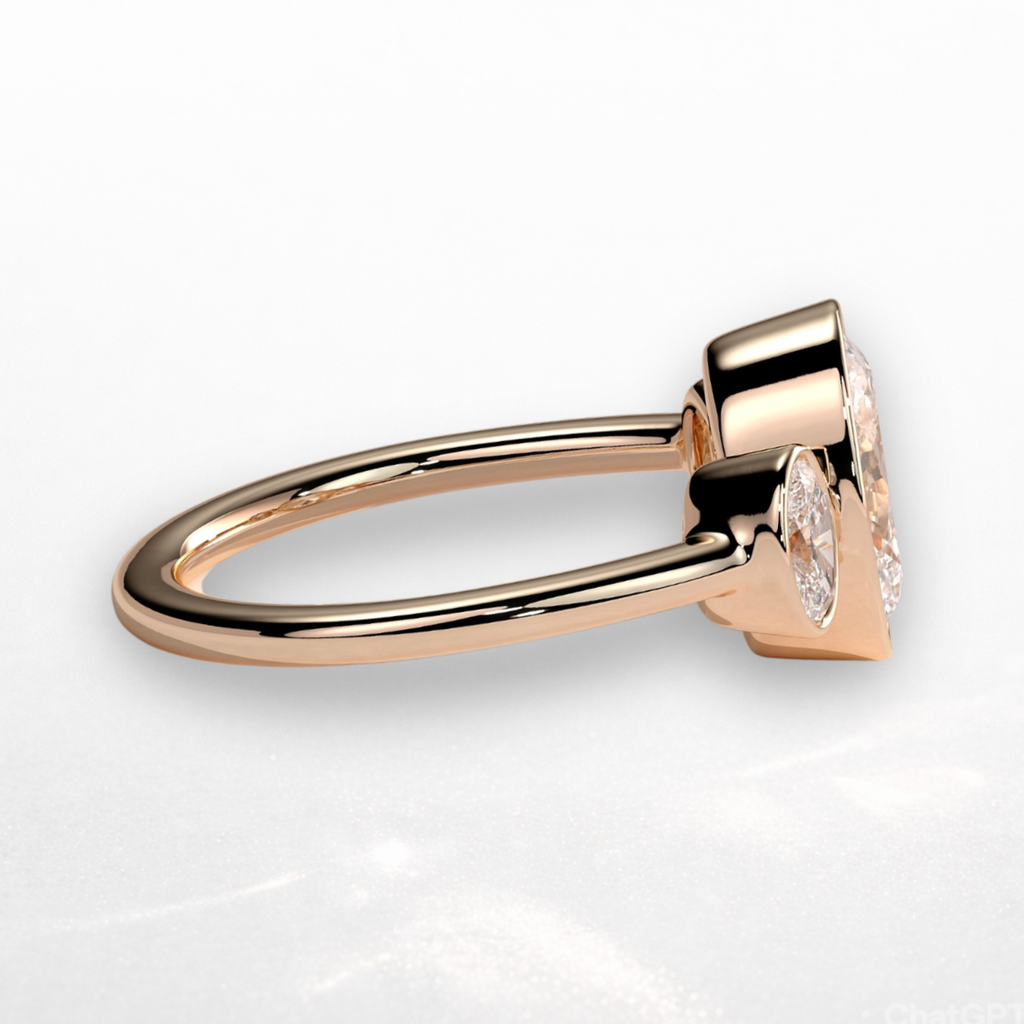 Oval Three Stone Bezel Ring